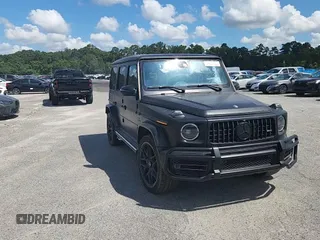 2022 Mercedes-Benz G 63 AMG with VIN W1NYC7HJ2NX444083, listed as a Copart auction lot 64764324 with 7,909 mi miles and Salvage title. Bid and sale history available at DreamBid. Image 14.