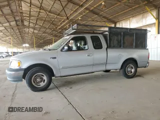 2000 Ford F-150 z VIN 2FTZX1726YCA51006, wystawiony jako Copart lot #60064205 z przebiegiem Nie podano mil oraz Szkoda całkowita • Salvage title. Historia ofert i sprzedaży dostępna na DreamBid. Obrazek 1.