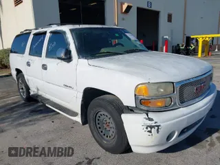 2006 GMC Yukon XL Denali with VIN 1GKFK66U56J142191, listed as a IAAI auction lot 41862921 with 147,655 mi miles. Bid and sale history available at carsss.com. Image 1.