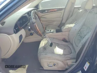 2008 Jaguar XJ with VIN SAJWA79B58SH25389, listed as a Copart auction lot 75014914 with 0 mi miles and Salvage Title. Bid and sale history available at carsss.com. Image 7.