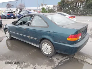 1997 Honda Civic DX with VIN 1HGEJ6128VL023684, listed as a IAAI auction lot 41502999 with 140,871 mi miles. Bid and sale history available at carsss.com. Image 3.