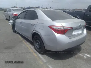 2015 Toyota Corolla L with VIN 5YFBURHE0FP281457, listed as a IAAI auction lot 39664934 with Not Provided miles and . Bid and sale history available at DreamBid. Image 3.