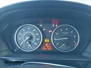 2008 BMW 5 Series 528i with VIN WBANU53588CT10273, listed as a IAAI auction lot 41080685 with 123,672 mi miles and . Bid and sale history available at DreamBid. Image 7.