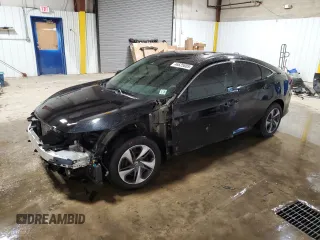 2020 Honda Civic LX z VIN 19XFC2F60LE213163, wystawiony jako Copart lot #46625605 z przebiegiem 44 319 mil mil oraz Szkody całkowita. Historia ofert i sprzedaży dostępna na DreamBid. Obrazek 1.