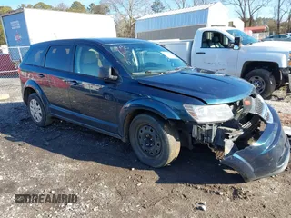 2014 Dodge Journey American Value z VIN 3C4PDCABXET222141, wystawiony jako IAAI lot #41447346 z przebiegiem 156 216 mil mil oraz . Historia ofert i sprzedaży dostępna na DreamBid. Obrazek 1.