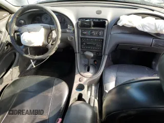 2002 Ford Mustang Deluxe with VIN 1FAFP44492F121223, listed as a Copart auction lot 62474065 with 128,984 mi miles and Salvage title. Bid and sale history available at DreamBid. Image 8.