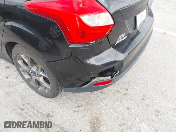 2014 Ford Focus SE with VIN 1FADP3K22EL325404, listed as a IAAI auction lot 42060162 with 115,265 mi miles. Bid and sale history available at carsss.com. Image 6.