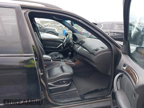 2001 BMW X5 3.0i with VIN WBAFA53501LM71185, listed as a IAAI auction lot 41610473 with 141,322 mi miles. Bid and sale history available at carsss.com. Image 5.