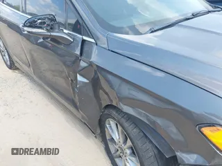 2017 Ford Fusion SE z VIN 3FA6P0H71HR410878, wystawiony jako IAAI lot #42135622 z przebiegiem 99 462 mil mil oraz . Historia ofert i sprzedaży dostępna na DreamBid. Obrazek 6.