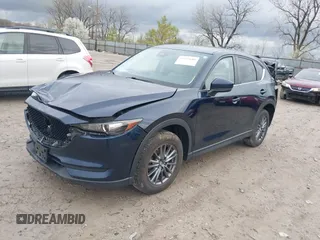 2017 Mazda CX-5 Touring with VIN JM3KFBCL7H0120552, listed as a IAAI auction lot 41953685 with 88,416 mi miles. Bid and sale history available at carsss.com. Image 2.
