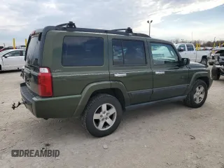 2006 Jeep Commander with VIN 1J8HG48K06C297654, listed as a Copart auction lot 51000155 with 126,235 mi miles and Salvage Title. Bid and sale history available at DreamBid. Image 3.