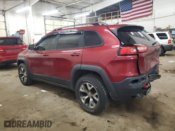 2015 Jeep Cherokee Trailhawk z VIN 1C4PJMBS9FW509642, wystawiony jako Copart lot #52385555 z przebiegiem 135 477 mil mil oraz Szkoda całkowita • Salvage title. Historia ofert i sprzedaży dostępna na DreamBid. Obrazek 2.