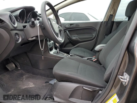 2018 Ford Fiesta SE z VIN 3FADP4BJ1JM115298, wystawiony jako Copart lot #76737564 z przebiegiem Nie podano mil oraz Szkoda całkowita • Salvage title. Historia ofert i sprzedaży dostępna na DreamBid. Obrazek 7.