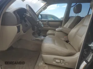 2006 Toyota Land Cruiser z VIN JTEHT05J262085007, wystawiony jako Copart lot #59312615 z przebiegiem 311 264 mil mil oraz Czysty tytuł • Clean title. Historia ofert i sprzedaży dostępna na DreamBid. Obrazek 7.