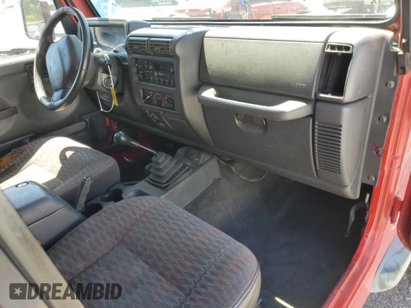 1999 Jeep Wrangler Sport with VIN 1J4FY19S7XP401120, listed as a Copart auction lot 64233665 with 129,708 mi miles and Salvage title. Bid and sale history available at DreamBid. Image 8.