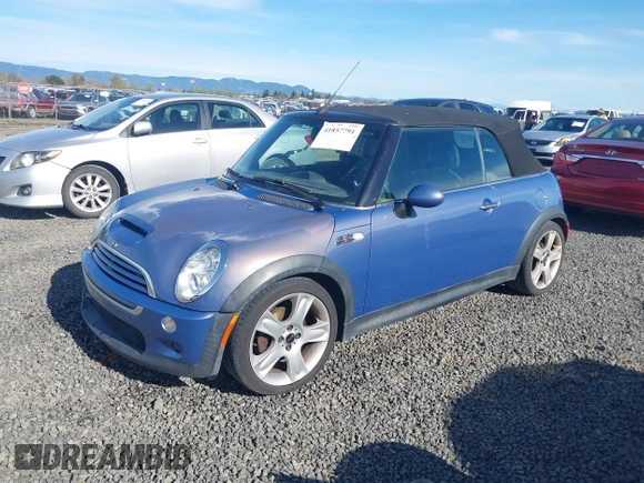 2005 MINI Convertible S with VIN WMWRH33455TF82408, listed as a IAAI auction lot 41857791 with 133,824 mi miles and . Bid and sale history available at DreamBid. Image 2.
