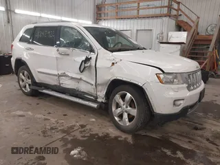 2013 Jeep Grand Cherokee Overland with VIN 1C4RJFCG7DC581808, listed as a IAAI auction lot 41242922 with 187,442 mi miles. Bid and sale history available at carsss.com. Image 1.
