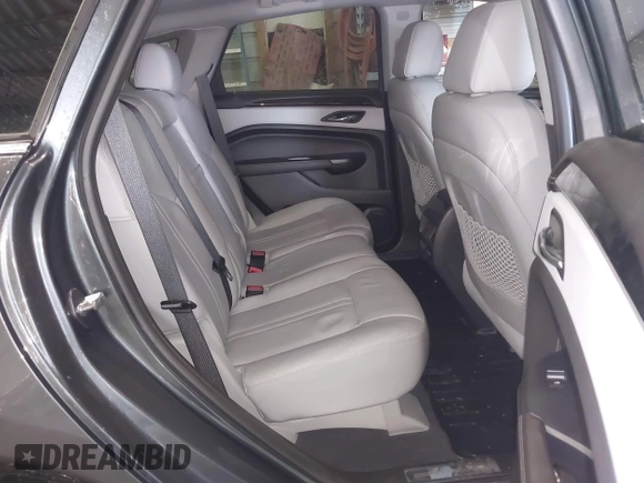 2013 Cadillac SRX Performance Collection with VIN 3GYFNHE37DS530908, listed as a IAAI auction lot 41662796 with 80,254 mi miles. Bid and sale history available at carsss.com. Image 8.