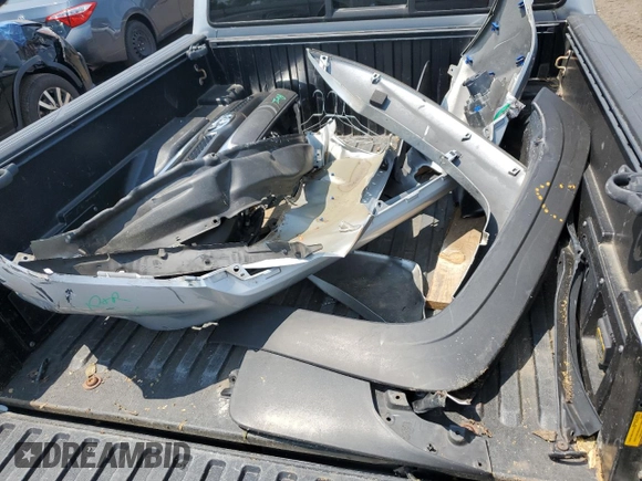 2013 Toyota Tacoma with VIN 3TMLU4EN8DM110455, listed as a Copart auction lot 60252235 with 119,702 mi miles and Salvage title. Bid and sale history available at DreamBid. Image 12.