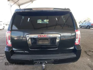 2016 GMC Yukon XL SLE with VIN 1GKS1FKC2GR147222, listed as a IAAI auction lot 41390201 with 86,385 mi miles. Bid and sale history available at carsss.com. Image 16.