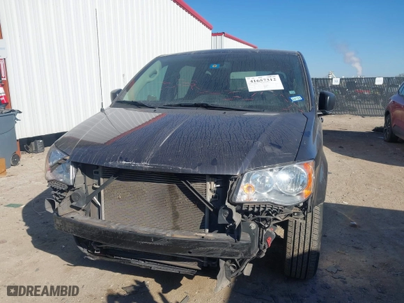 2018 Dodge Grand Caravan SE with VIN 2C4RDGBG3JR348560, listed as a IAAI auction lot 41657312 with 135,007 mi miles. Bid and sale history available at carsss.com. Image 6.