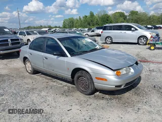 2002 Saturn SL z VIN 1G8ZH52842Z160911, wystawiony jako IAAI lot #42025957 z przebiegiem 220 560 mil mil oraz . Historia ofert i sprzedaży dostępna na DreamBid. Obrazek 1.