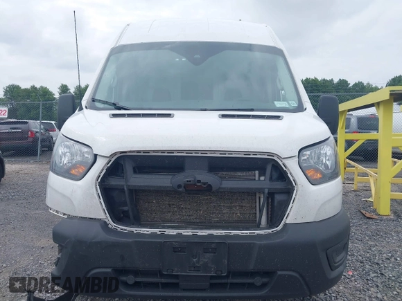 2024 Ford Transit Cargo z VIN 1FTBR3X89RKA14329, wystawiony jako IAAI lot #42483348 z przebiegiem 85 692 mil mil oraz . Historia ofert i sprzedaży dostępna na DreamBid. Obrazek 12.