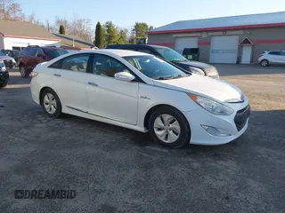2013 Hyundai Sonata Hybrid with VIN KMHEC4A45DA065198, listed as a IAAI auction lot 42137511 with 219,500 mi miles. Bid and sale history available at carsss.com. Image 1.