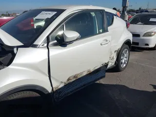 2019 Toyota C-HR XLE with VIN JTNKHMBX4K1058916, listed as a IAAI auction lot 41296963 with 113,290 mi miles. Bid and sale history available at carsss.com. Image 6.