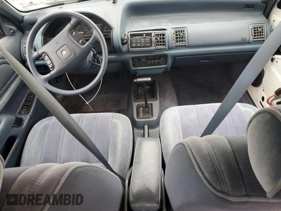1992 Mercury Topaz GS z VIN 2MEPM36U1NB611321, wystawiony jako Copart lot #56950595 z przebiegiem 54 164 mil mil oraz Szkoda całkowita • Salvage title. Historia ofert i sprzedaży dostępna na DreamBid. Obrazek 8.