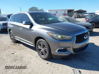 2016 Infiniti QX60 with VIN 5N1AL0MN5GC502797, listed as a IAAI auction lot 41242329 with 212,317 mi miles. Bid and sale history available at carsss.com. Image 1.