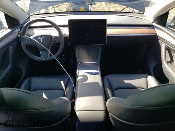 2024 Tesla Model Y with VIN 7SAYGDED3RF114643, listed as a Copart auction lot 56557075 with 3,021 mi miles and Salvage Title. Bid and sale history available at DreamBid. Image 8.