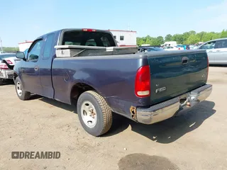 2000 Ford F-150 XL with VIN 1FTZX1723YNB00043, listed as a IAAI auction lot 42215601 with Not provided miles and . Bid and sale history available at DreamBid. Image 3.