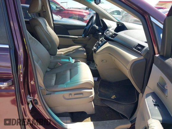2011 Honda Odyssey EX-L with VIN 5FNRL5H60BB094647, listed as a IAAI auction lot 42223712 with 202,612 mi miles and . Bid and sale history available at carsss.com. Image 5.