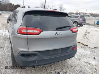 2016 Jeep Cherokee 75th Anniversary with VIN 1C4PJLCB1GW297555, listed as a IAAI auction lot 41232269 with 257,033 mi miles. Bid and sale history available at carsss.com. Image 16.
