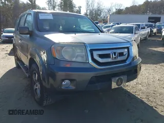 2011 Honda Pilot EX-L with VIN 5FNYF3H66BB018616, listed as a IAAI auction lot 41449001 with 221,499 mi miles and . Bid and sale history available at carsss.com. Image 1.