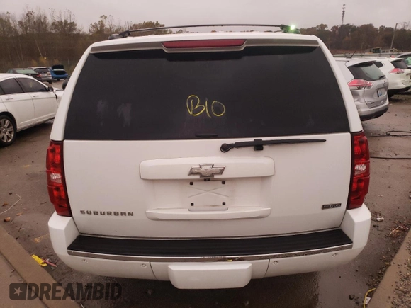 2009 Chevrolet Suburban LTZ with VIN 1GNFC36019J122990, listed as a Copart auction lot 79067174 with 167,632 mi miles and Salvage title. Bid and sale history available at DreamBid. Image 6.