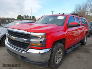 2018 Chevrolet Silverado 1500 LT with VIN 1GCVKREC3JZ170745, listed as a IAAI auction lot 41590416 with 124,577 mi miles. Bid and sale history available at carsss.com. Image 2.