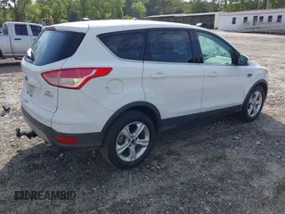 2014 Ford Escape SE with VIN 1FMCU0GXXEUC64892, listed as a IAAI auction lot 42101842 with 128,932 mi miles and . Bid and sale history available at DreamBid. Image 4.