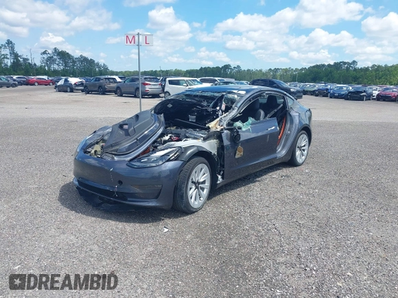 2022 Tesla Model 3 Long Range z VIN 5YJ3E1EB0NF124664, wystawiony jako IAAI lot #34246337 z przebiegiem Nie podano mil oraz . Historia ofert i sprzedaży dostępna na DreamBid. Obrazek 2.