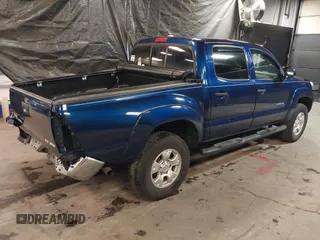 2014 Toyota Tacoma with VIN 3TMLU4EN4EM156933, listed as a IAAI auction lot 41197904 with 128,183 mi miles. Bid and sale history available at carsss.com. Image 4.
