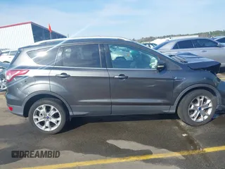 2015 Ford Escape Titanium with VIN 1FMCU0JX1FUB92412, listed as a IAAI auction lot 41893933 with 95,306 mi miles. Bid and sale history available at carsss.com. Image 12.