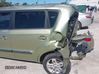 2011 Kia Soul + with VIN KNDJT2A21B7256665, listed as a IAAI auction lot 41741905 with 56,312 mi miles. Bid and sale history available at carsss.com. Image 14.
