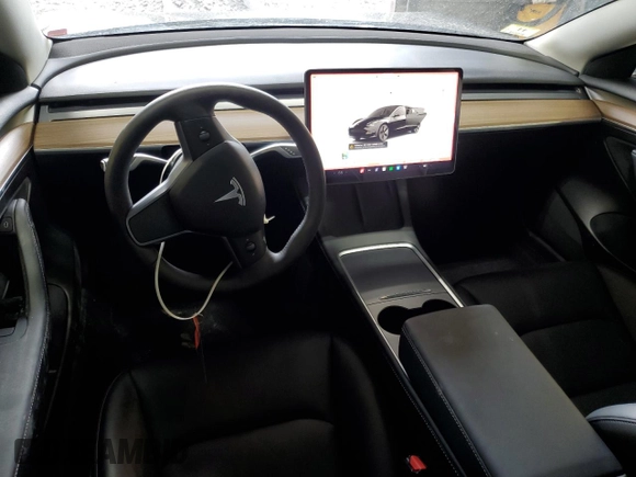 2023 Tesla Model 3 Long Range with VIN 5YJ3E1EB8PF392705, listed as a Copart auction lot 47595985 with 15,361 mi miles and Salvage Title. Bid and sale history available at DreamBid. Image 8.