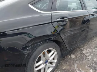 2016 Ford Fusion SE with VIN 1FA6P0H76G5117348, listed as a IAAI auction lot 41813670 with 148,100 mi miles. Bid and sale history available at carsss.com. Image 14.