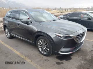 2016 Mazda CX-9 Signature with VIN JM3TCBEY9G0118547, listed as a IAAI auction lot 41500960 with 183,962 mi miles and . Bid and sale history available at carsss.com. Image 1.