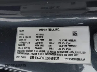 2023 Tesla Model 3 Long Range with VIN 5YJ3E1EBXPF708122, listed as a IAAI auction lot 41185314 with 27,765 mi miles and . Bid and sale history available at DreamBid. Image 9.