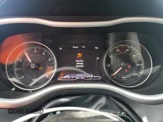 2014 Jeep Cherokee Trailhawk with VIN 1C4PJMBS6EW140981, listed as a Copart auction lot 58260325 with 97,036 mi miles and Salvage title. Bid and sale history available at DreamBid. Image 9.