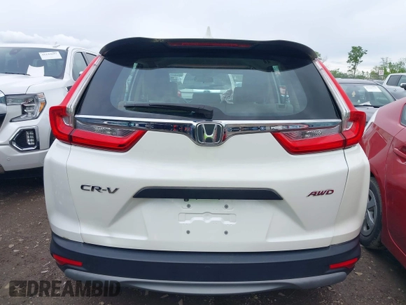 2018 Honda CR-V LX z VIN 2HKRW6H37JH215564, wystawiony jako IAAI lot #42191977 z przebiegiem 90 994 mil mil oraz . Historia ofert i sprzedaży dostępna na DreamBid. Obrazek 16.