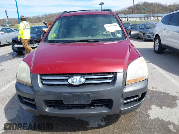 2007 Kia Sportage LX with VIN KNDJF724577371572, listed as a IAAI auction lot 41817960 with 213,062 mi miles. Bid and sale history available at carsss.com. Image 12.